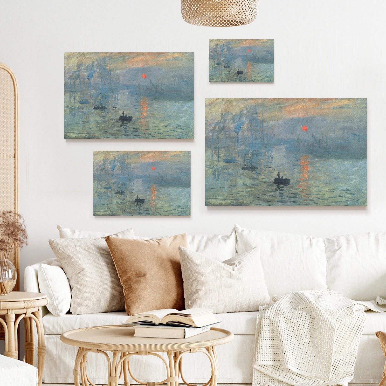 Monet's Sunrise Beach Canvas Prints in various sizes above a sofa, wall art home decor.