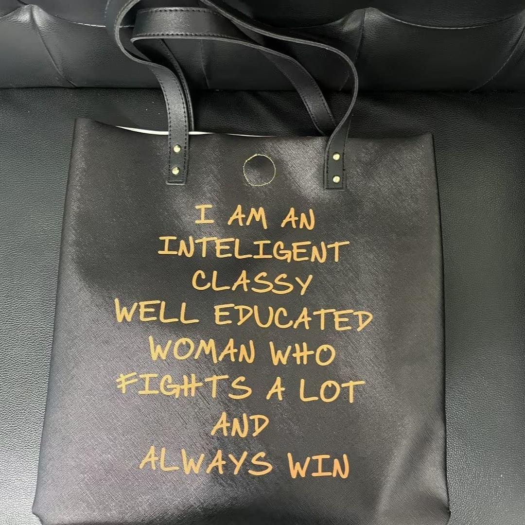 I am an inteligent classy well educated woman who fights a lot and always win Bag