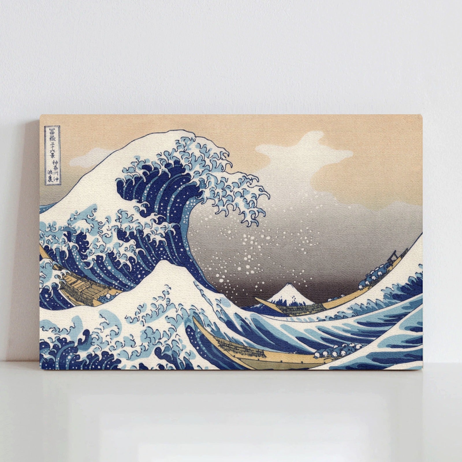 The Great Wave off Kanagawa Canvas Print, featuring blue waves, Mount Fuji, and Japanese art.