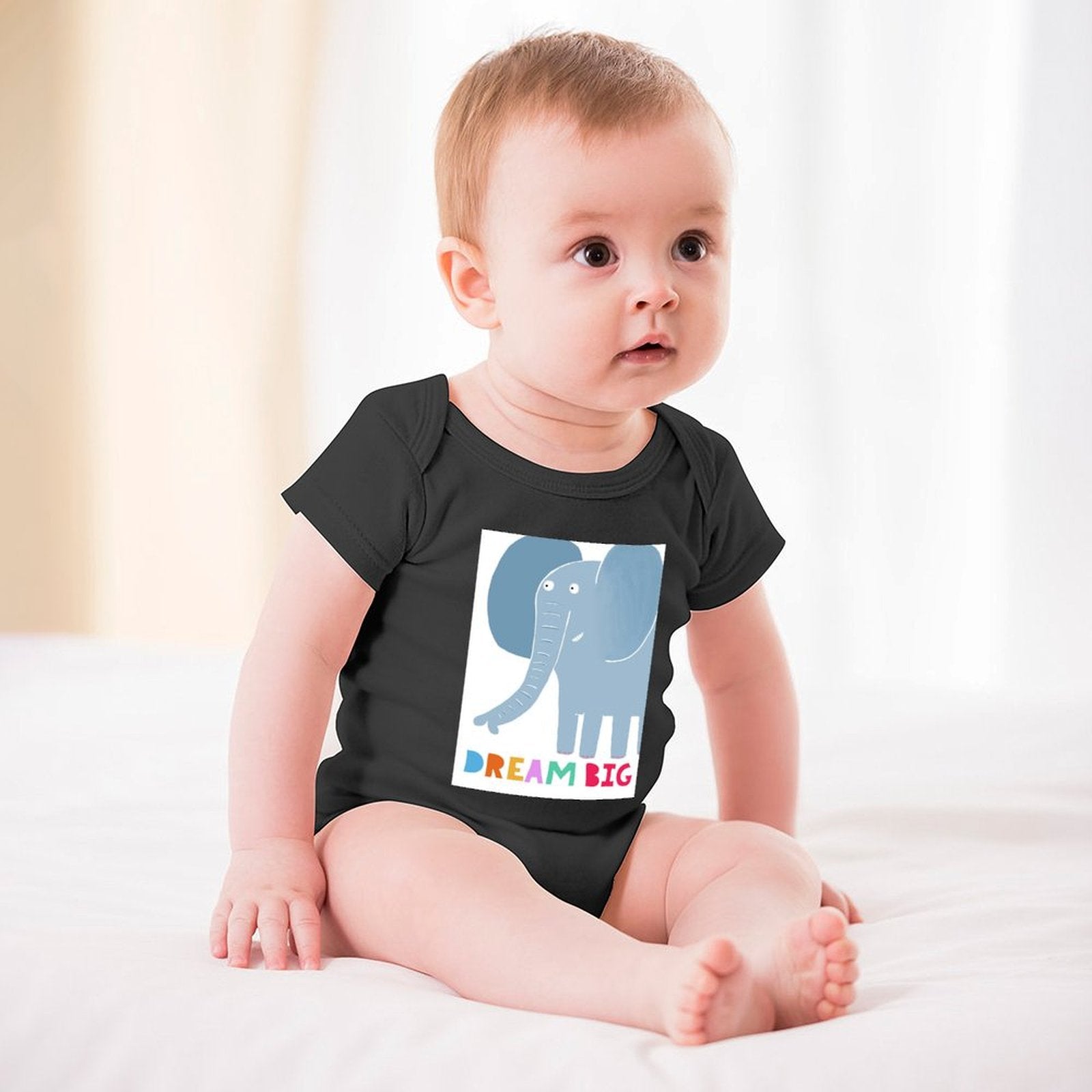 Black baby bodysuit with Dream Big Elephant design. Soft cotton baby clothing.