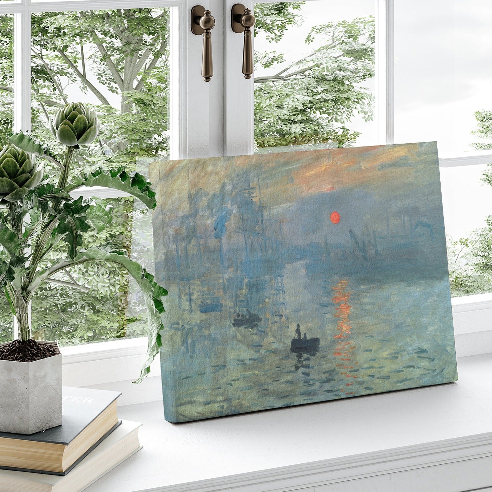 Claude Monet Sunrise Beach Canvas Print on windowsill, sunrise over water, wall art for home decor.